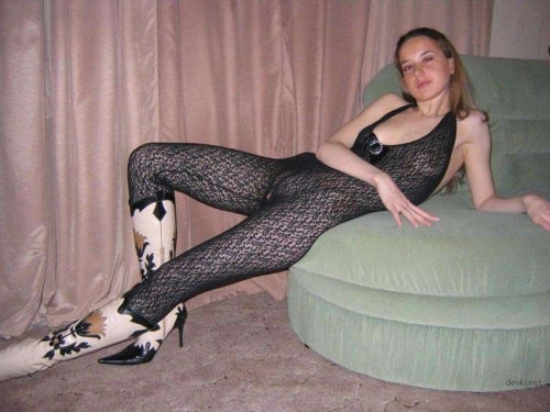 Sexy Woman in Boots: Intimate Nude Photo with Explicit Content