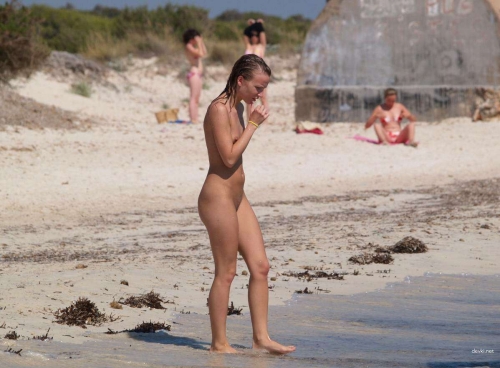 Topless Nude Sunbather Relaxing on Beach - Explicit Nudist Exposed
