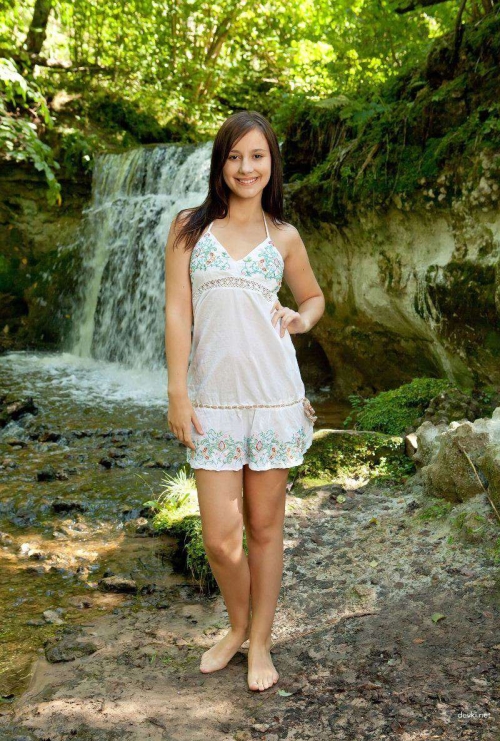 Smiling Girl Strips Outdoors: Explicit Nature Nudity