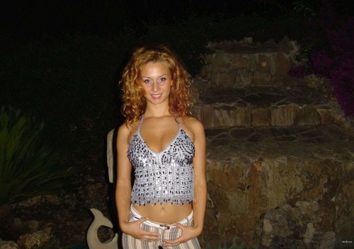 Half-naked girl in panties flaunting her curves