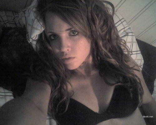 Naked Girl's Bare Breasts: Explicit Photo of Busty Woman