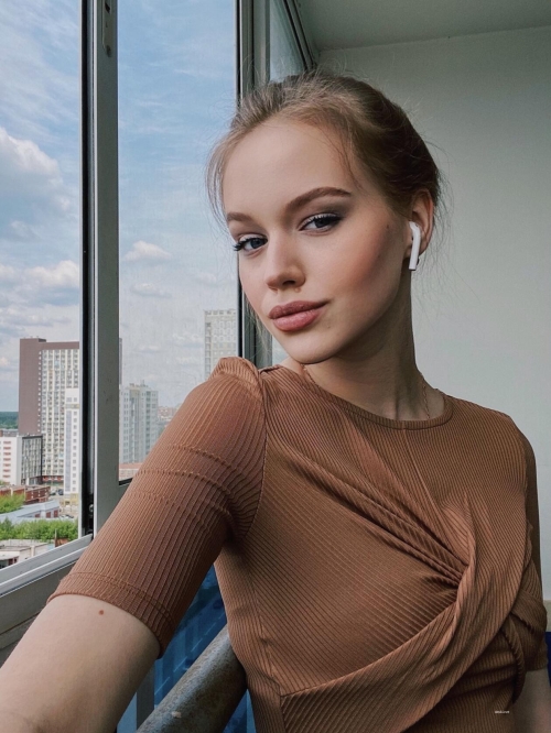 Sweet Kitty: Naughty and Playful Russian Catgirl Shows Off Her Seductive Charm in Sensual Photoshoot