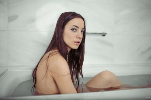 Sexy Girl in Bath Showing Off Her Assets