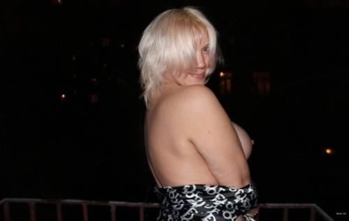 Voluptuous Woman with Busty Cleavage - Seductive Beauty Exposed