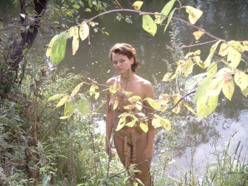 Nude Woman in Nature: Explicit Outdoor Erotic Photography
