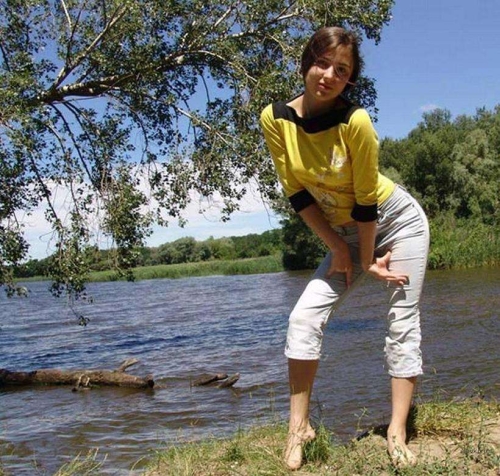 Naked River Poses: Provocative Nude Model by the Water's Edge