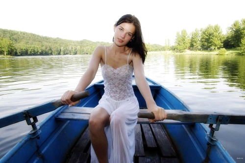Sultry Brunette Rides Boat: Explicit Waterside Seduction