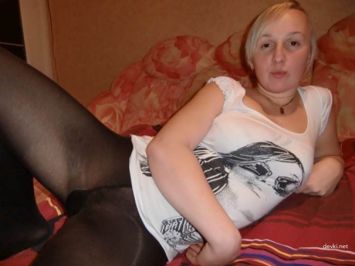Hot Wife Poses on Bed in Black Pantyhose Without Panties