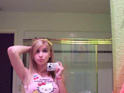 Blonde Bombshell Selfie: Sexy and Seductive Pose
