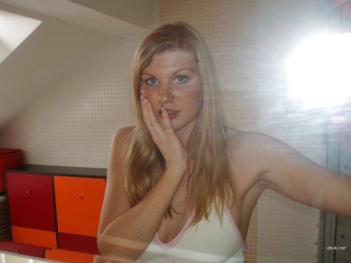 Seductive Smiling Girl Poses - Sensual Beauty in Lingerie
