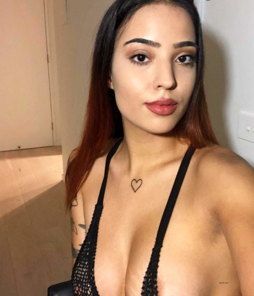 Private Photo of Stunning Girl with Tattoo: Explicit Beauty Shot