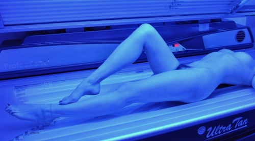 Steamy Solarium Seduction: Sensual Erotica of a Beautiful Girl