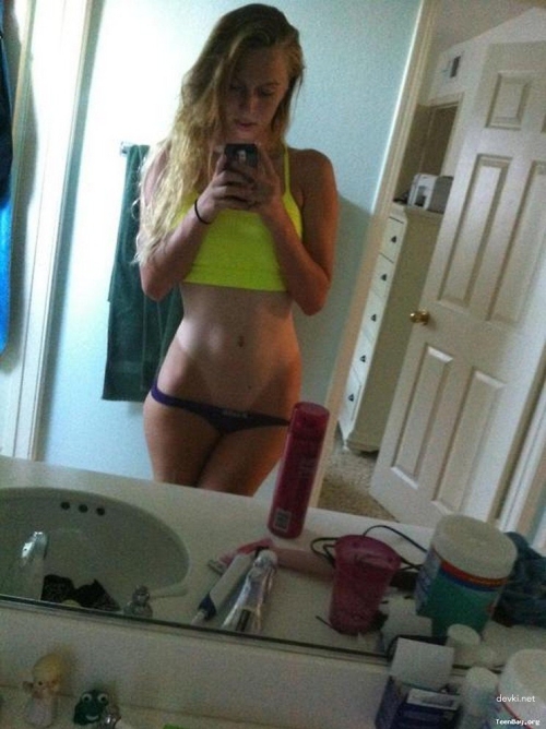 Sun-Kissed Skin on Nude Girl: Explicit Tan Lines Photo