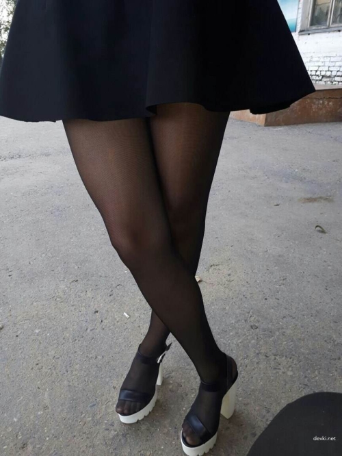 Girl in Skirt and Stockings Shows Off Her Pussy - Explicit Upskirt Photo