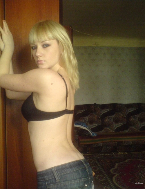 Explicit Home Photoshoot of a Young Girl - Sensual and Provocative Imagery