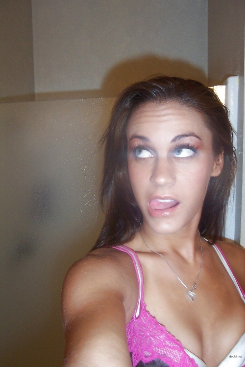 Topless Selfie: Bold Girl Captures Herself in Provocative Pose