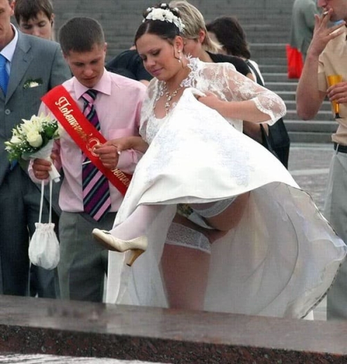 Bride's Wardrobe Malfunction: Explicit Wedding Dress Mishap