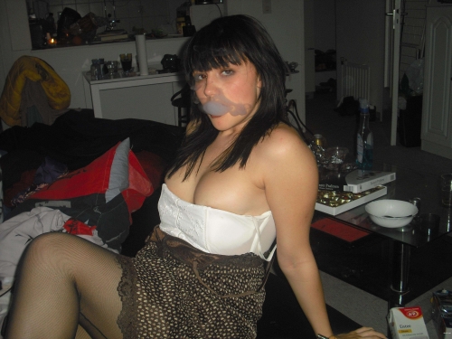 Explicit Nude Girl Showing Bare Breasts - Sensual and Provocative Photo