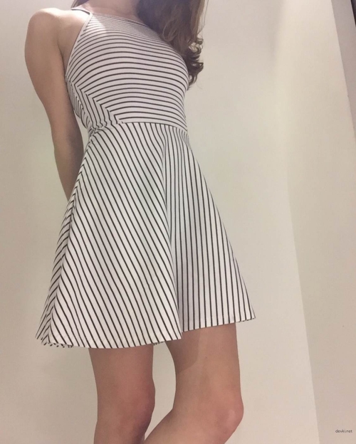 Topless Girl Lifts Dress Showing No Panties - Explicit Upskirt Photo