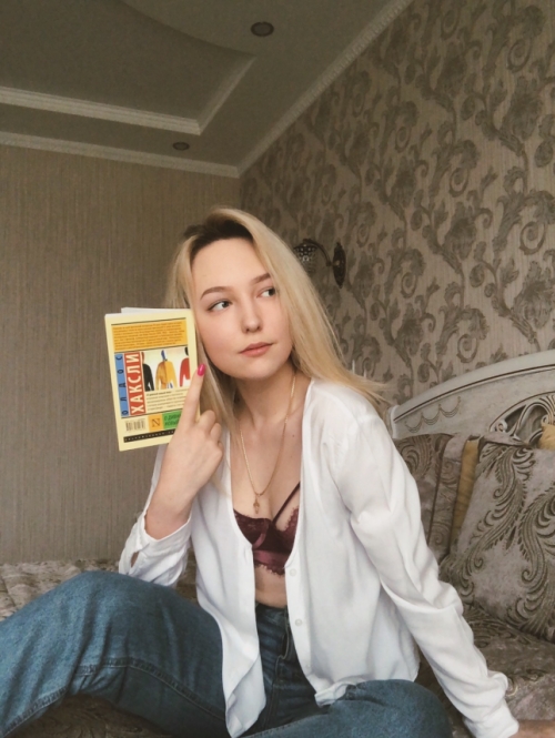Sensual Blonde Girl in Light Erotic Poses