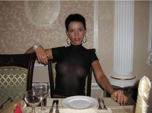 Seductive Woman with Short Hair in Erotic Photo Shoot on Vacation