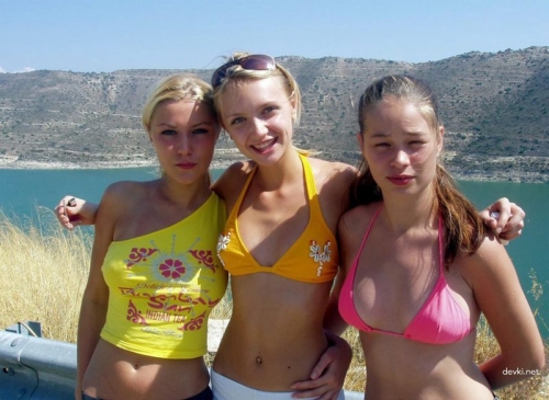 Hot Babes on Vacation: Bikini-clad Besties Enjoying Sun and Fun
