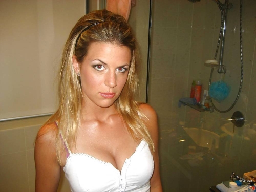 Sucking off her boyfriend in explicit blowjob photo