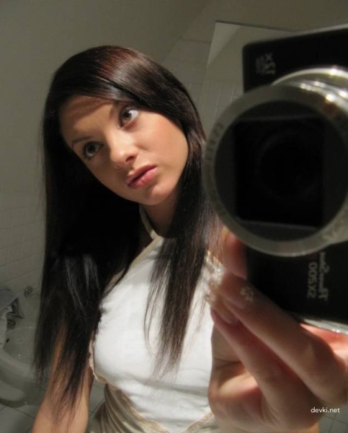 Drunk Girl Poses for Photos After Nightclub Party