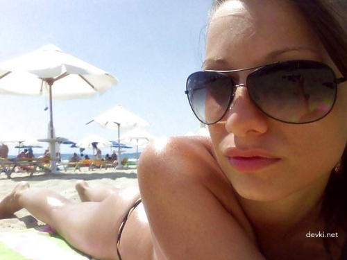 Hot Beach Babe Sunbathing - Sexy Girl Tanning Topless on the Beach