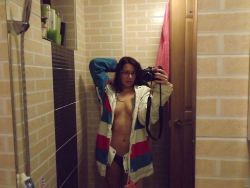 Selfie Mirror Photo: Bold and Explicit Self-Portrait Captured in Mirror