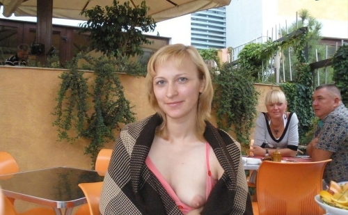 Small-Breasted Woman Exposed: Explicit Topless Photo for Mature Audience