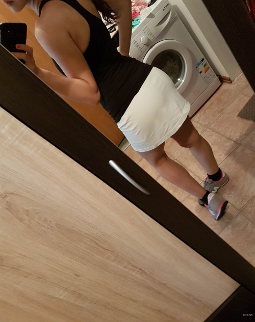 Slim woman undresses in explicit photoshoot