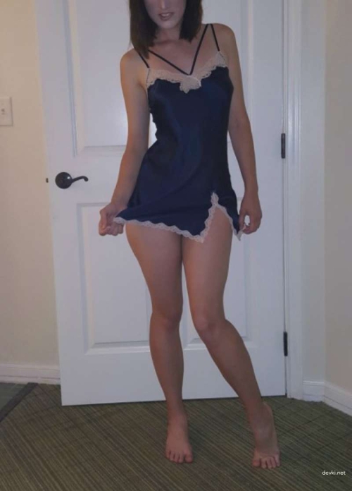 Young girl strips off lingerie for sexy photoshoot
