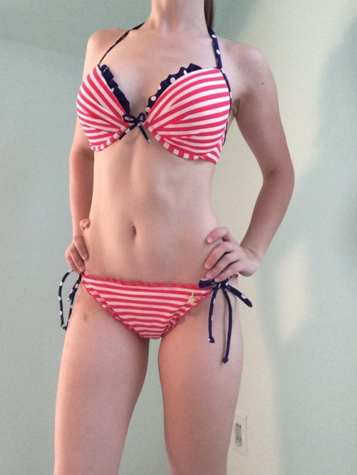 Blonde Bikini Babe Strips Down, Flaunting Slim Figure in Explicit Poses