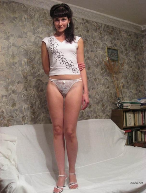 Mature Woman with Hairy Pussy Shows Off Long Legs - Explicit Adult Content