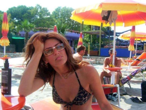 Sultry Mature Mommy in Erotic Pose: Sensual MILF Seduction