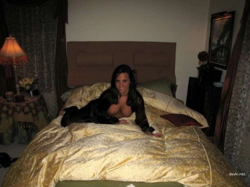 Amateur Erotica with Tanned Beauty: Explicit and Sensual Photos