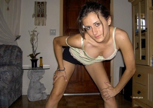 Sensual Young Woman's Erotic Home Photos: Explicit and Provocative Shots