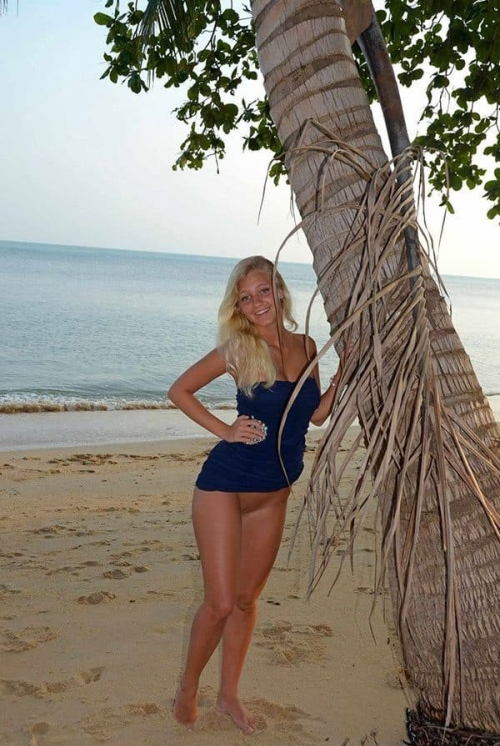 Seductive Babe Relaxing: Hot Girl on Vacation Beach - Sensual Beauty in Swimsuit
