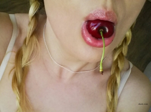 Naked Beauty with Cherry Poses Seductively