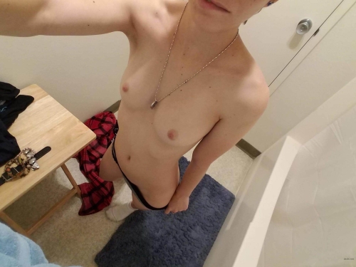 Slender girl flaunts her large labia in explicit pose