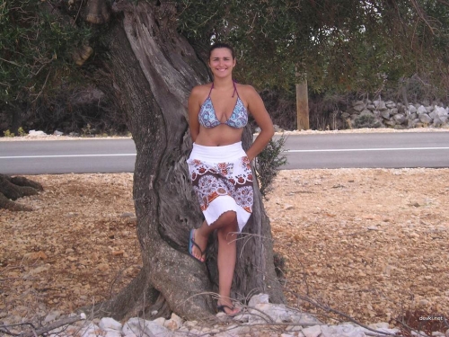 Attractive Mature Lady Relaxing - Sexy Vacation Photo!
