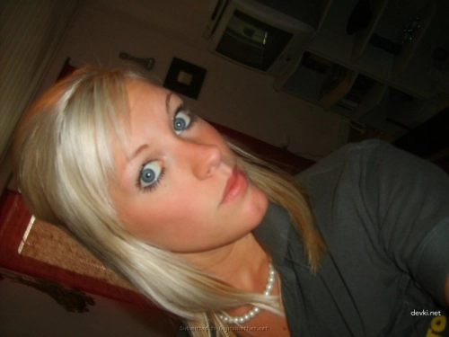 Blonde babe gives a steamy handjob to her horny friend