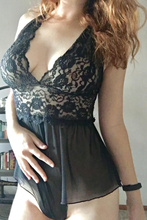 Sultry Redhead Wife Flaunts Erotic Outfits in Sensual Display