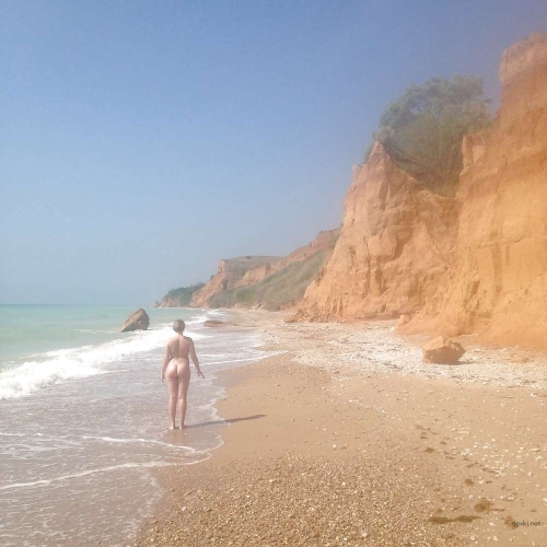 Fully Nude Nudist Babe Exposing Every Inch for Your Pleasure