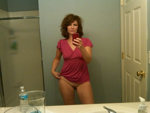 Redhead Woman Takes Nude Selfie - Explicit Adult Content