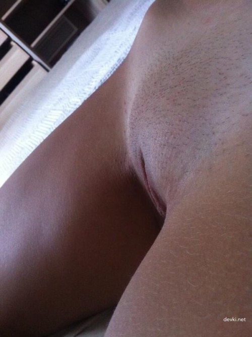 Explicit Close-Up of Girl's Pussy - XXX Photo