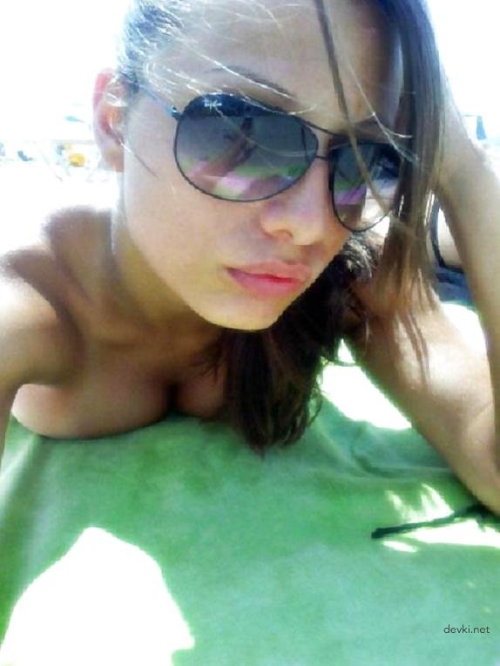 Hot Beach Babe Sunbathing - Sexy Girl Tanning Topless on the Beach