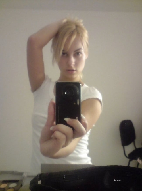 Blonde Bombshell Mirror Selfie: Sultry and Seductive Blonde Takes Hot Selfie in Front of Mirror