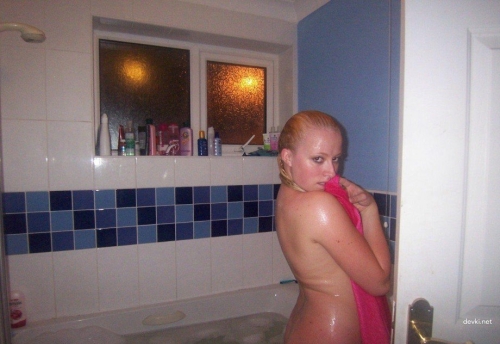 Naked Blonde with Small Tits: Explicit Photo of a Busty Girl